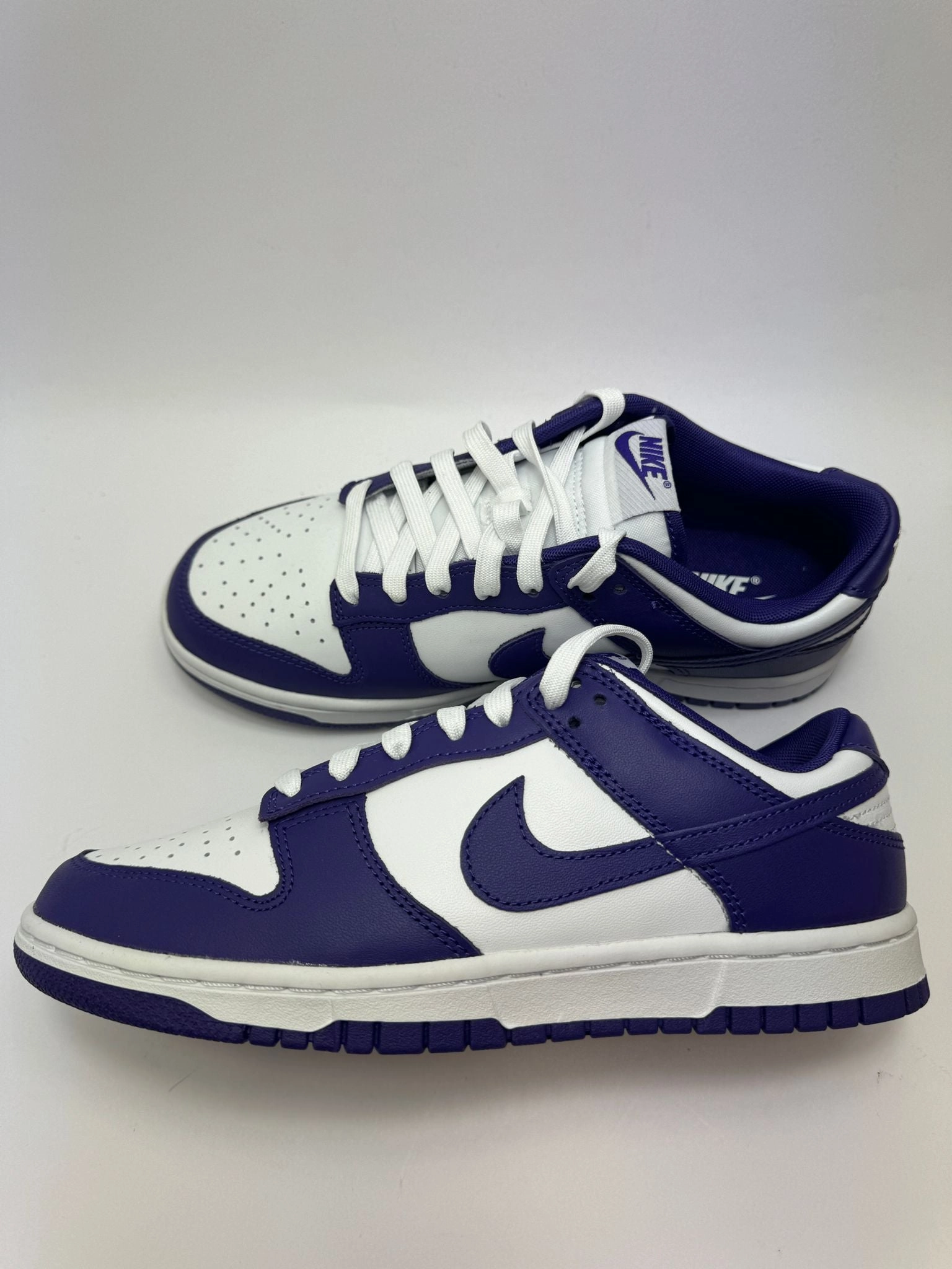 Nike Dunk Low "Championship Court Purple" pre - run stretch road - running