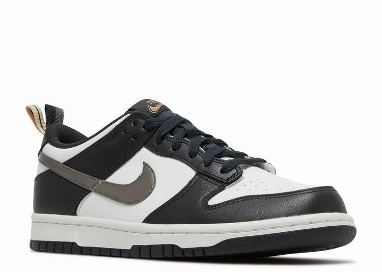 Nike Dunk Low Black White Metallic (GS) running with a running belt GelCushion