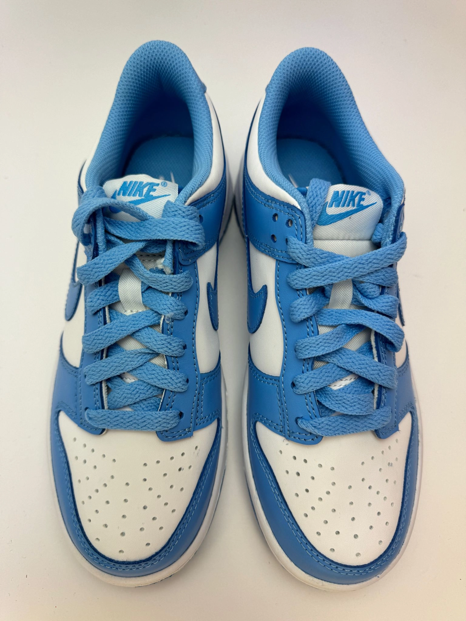 Nike Dunk Low "UNC" tempo running