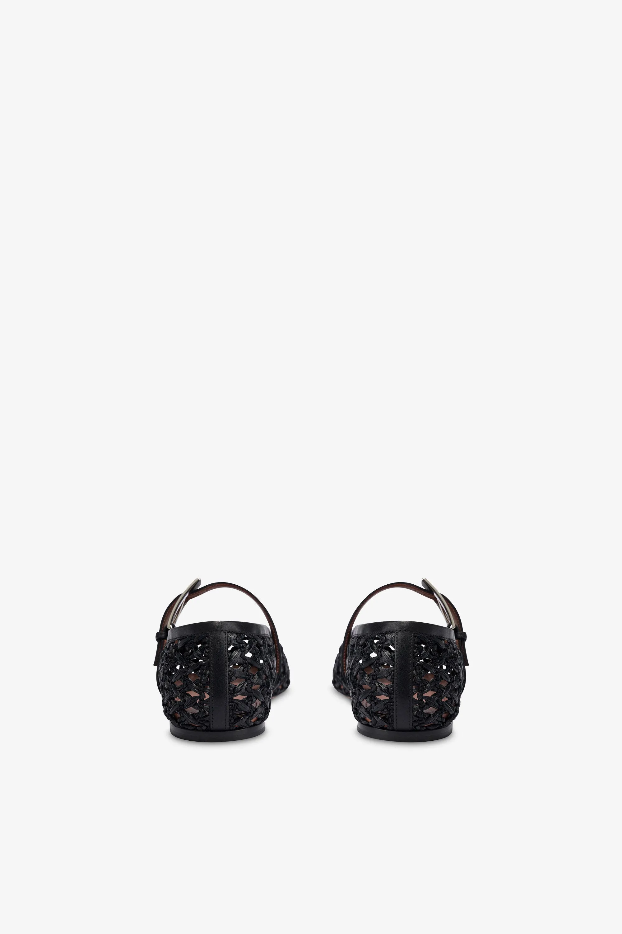 Ballet flats in black raffia and leather
