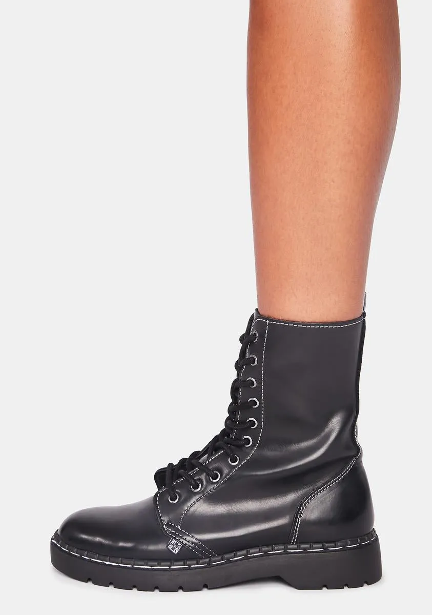 Black Waxy 10-Eye Boot With White Stitch