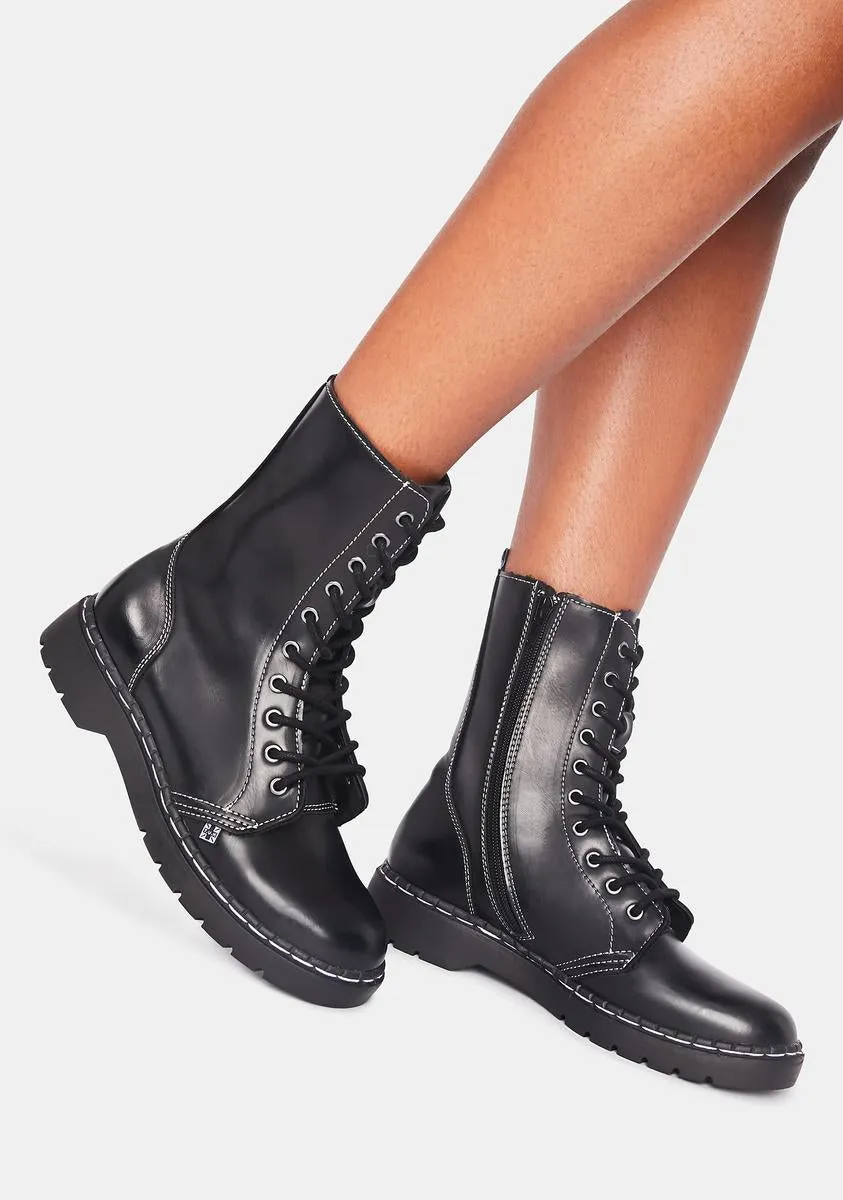 Black Waxy 10-Eye Boot With White Stitch