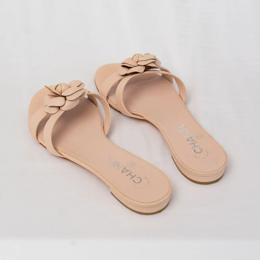 Chanel Nude Leather CC Camellia Embellished Flat Slides, 38