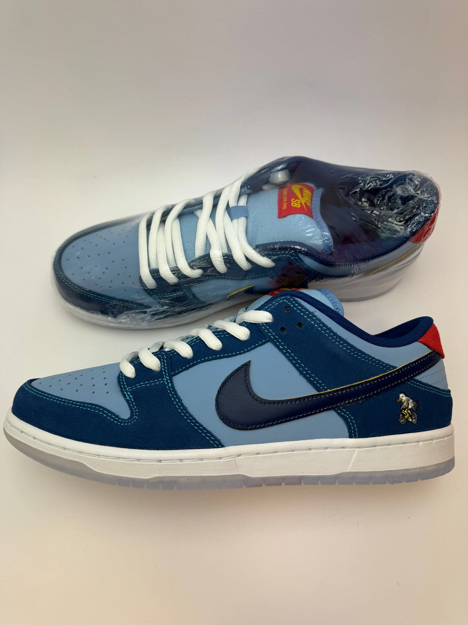 fitness shoe items hydration packs Nike SB Dunk Low "Why So Sad?"