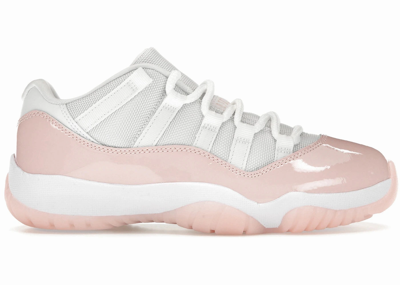Jordan 11 Retro Low Legend Pink sandy terrain