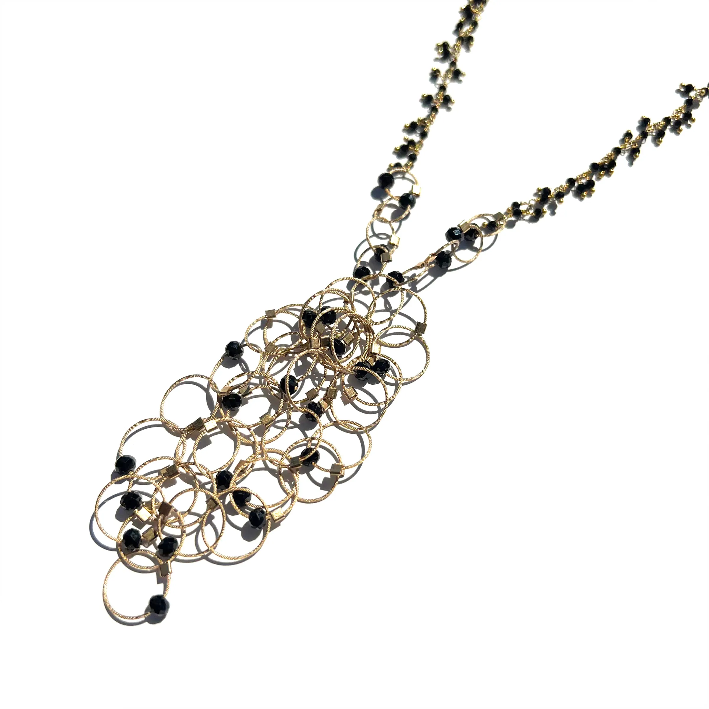 Interlock Tassel Necklace