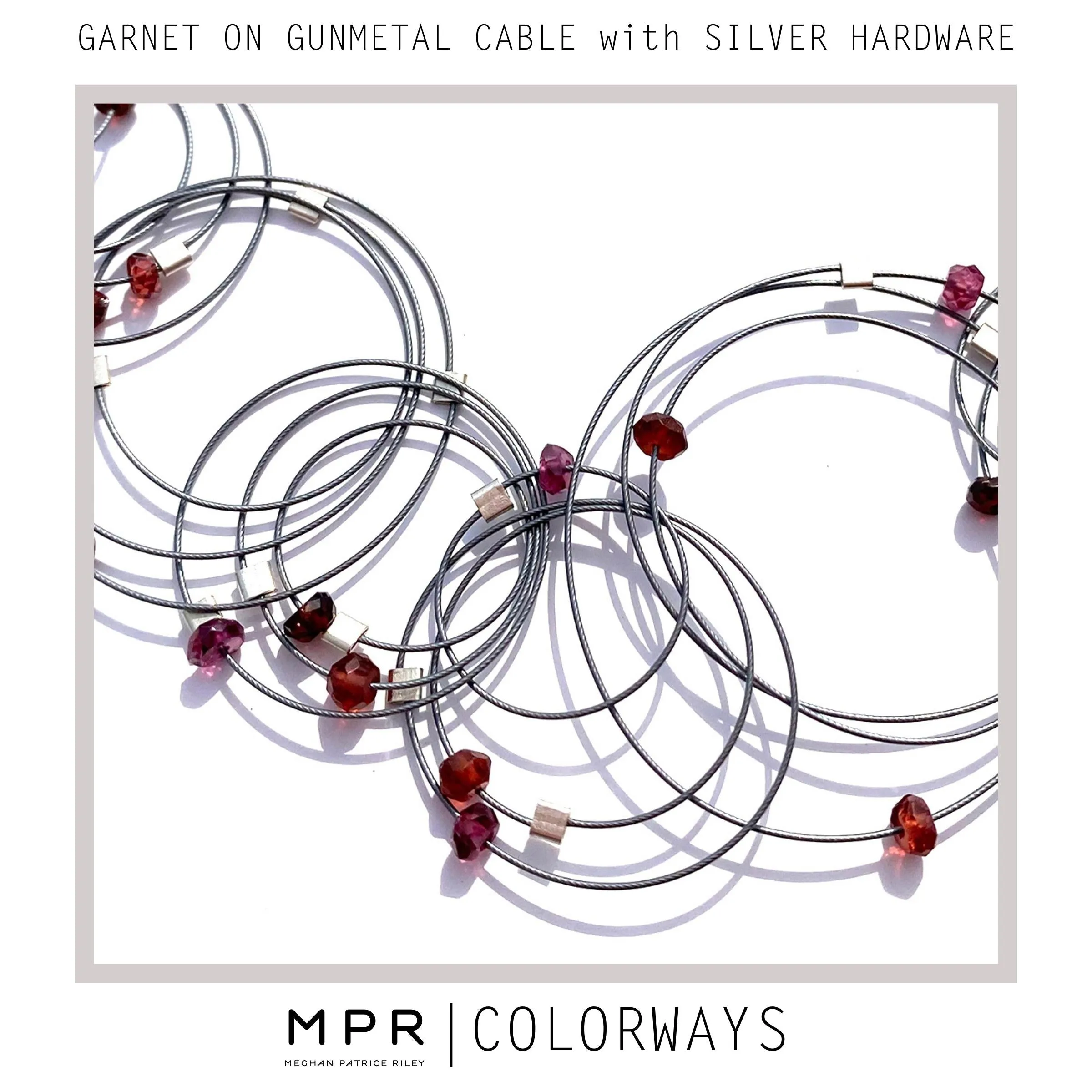 Interlock Tassel Necklace