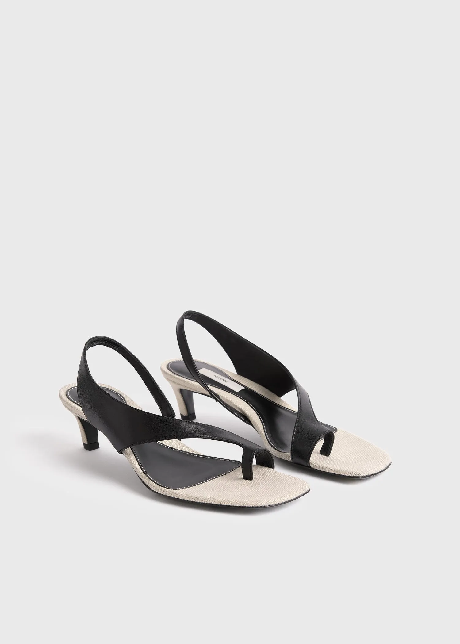 Leather heeled thong sandals black/sand