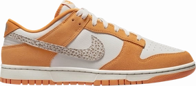 running in a marsh area shoes Nike Dunk Low "Safari Swoosh Kumquat" (Myrtle Beach Location)