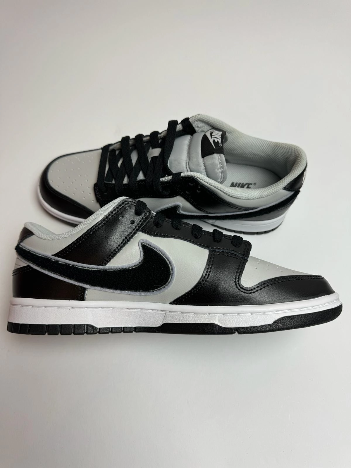 running for balance Nike Dunk Low "Chenille Swoosh Black Grey"