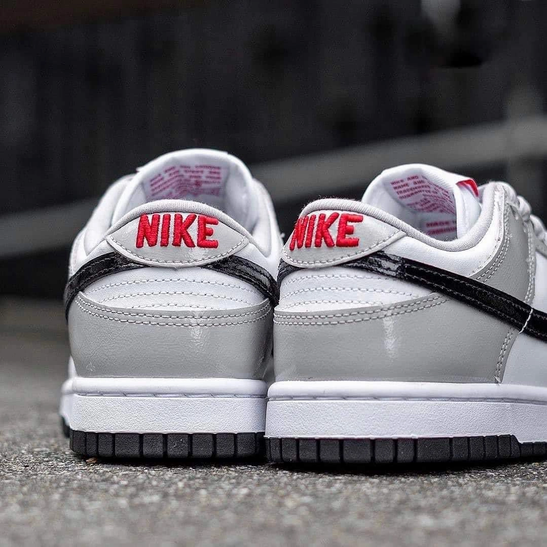 Nike Dunk Low Light Iron Ore running during sunset