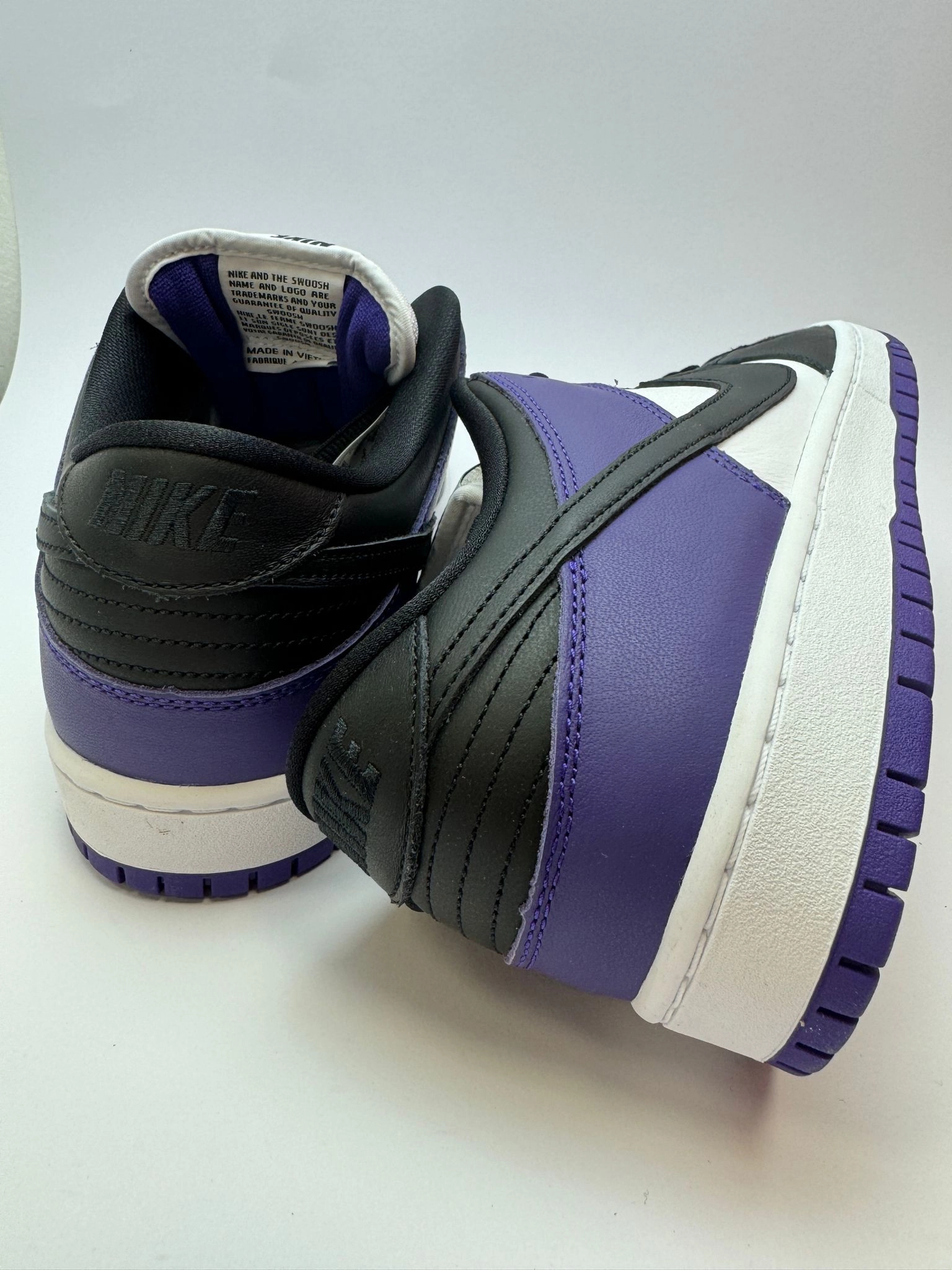 Nike SB Dunk Low "Court Purple" running for joint flexibility running in a mud pot area shoes