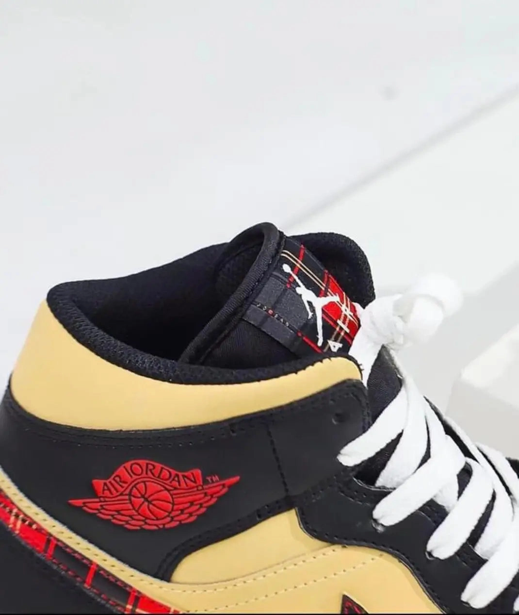 Air Cushioning Air Jordan 1 Mid Tartan Swoosh