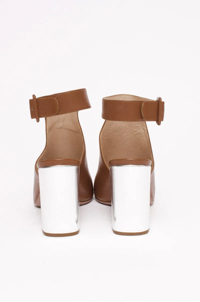 SILVER HEEL PUMPS