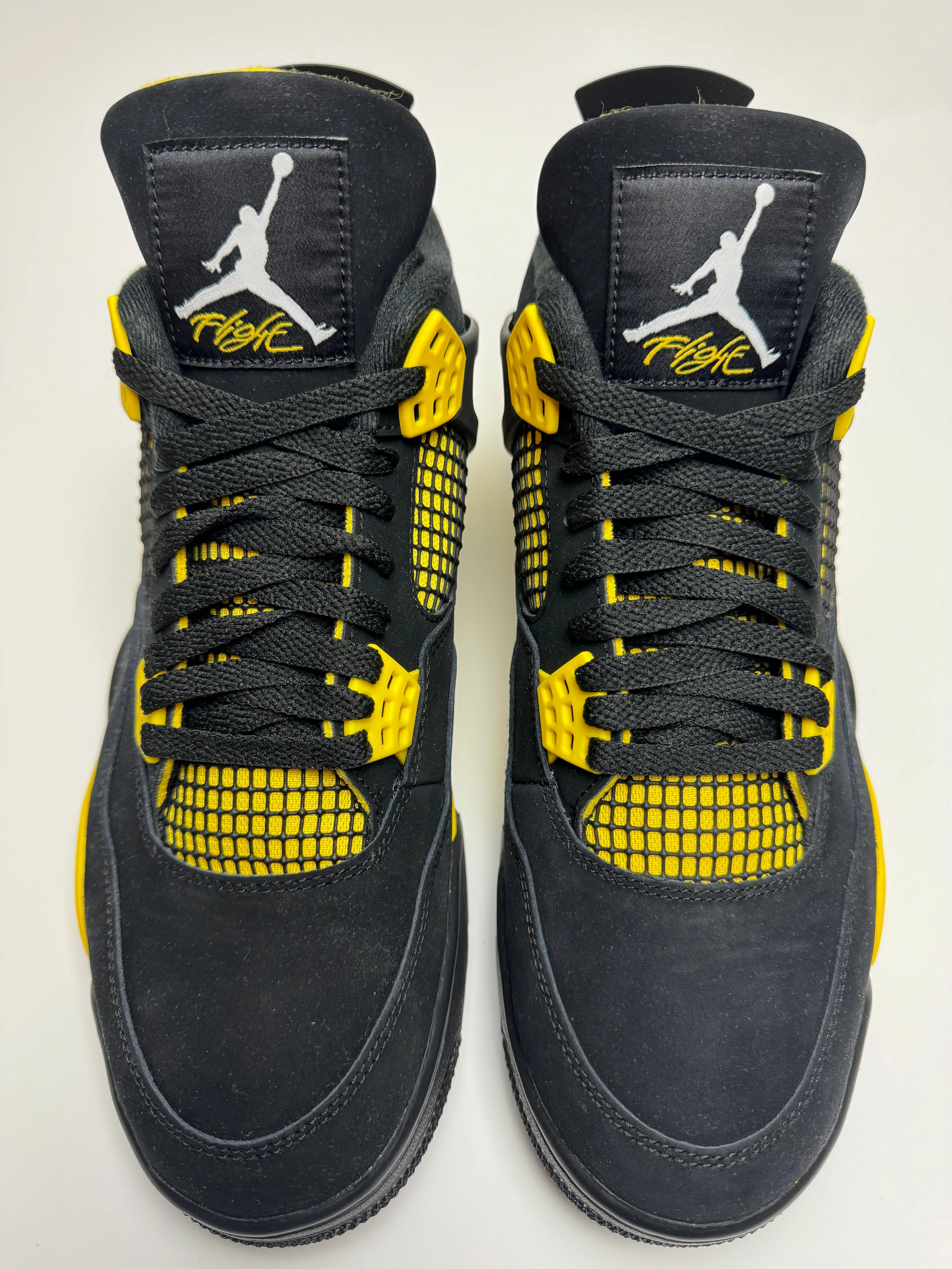 Air Jordan 4 "Thunder" maximalist - feature shoes proprioception - enhancing shoes