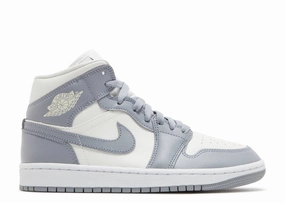 Jordan 1 Mid Stealth (W) Comfortable Collar Padding running in a racecourse