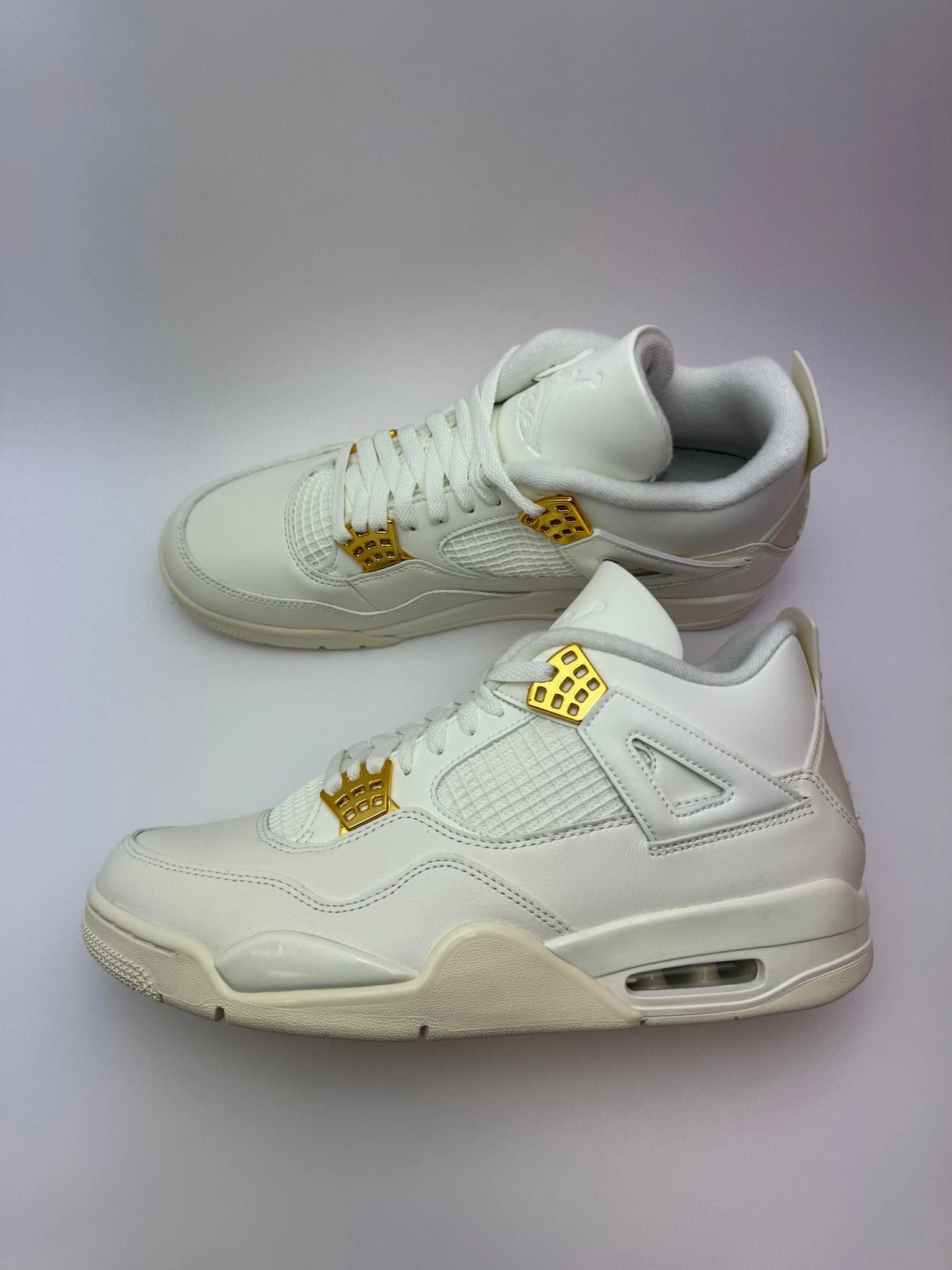 Jordan 4 Retro "Metallic Gold" spring - loaded running option