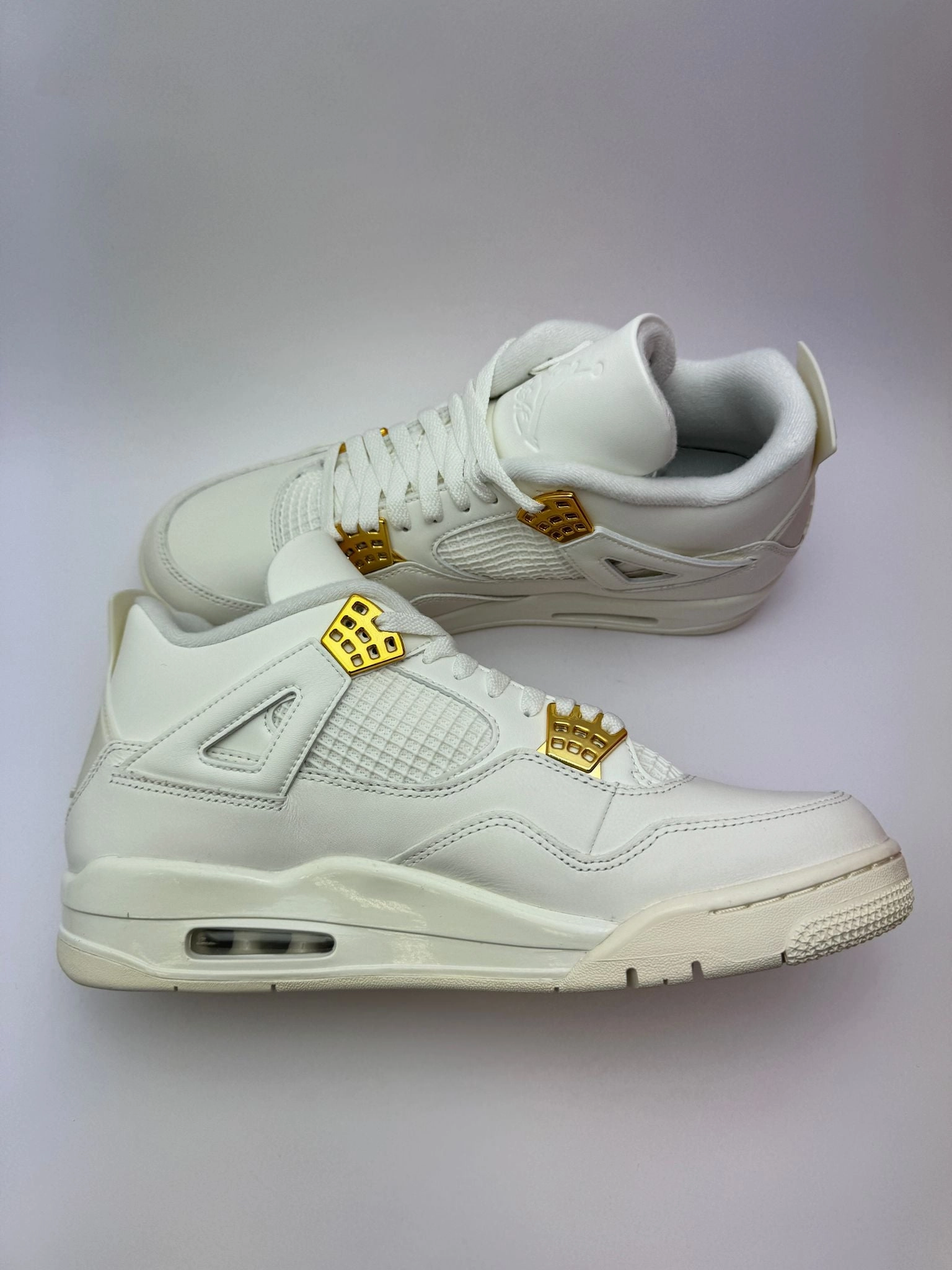 Reinforced toe slow - paced running shoes Jordan 4 Retro "Metallic Gold"