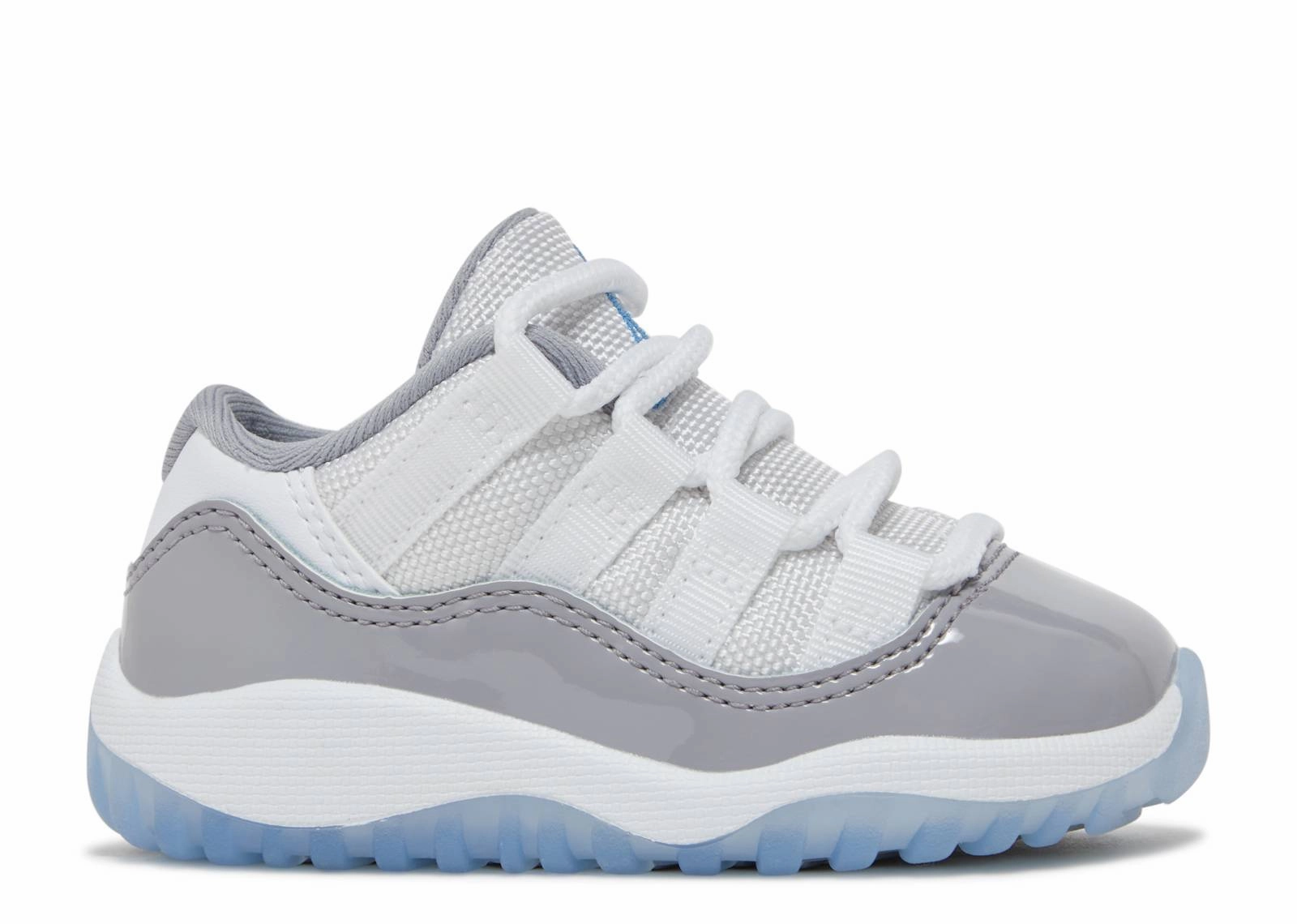 Jordan 11 Retro Low Cement Grey TD running with a running vest reflective visibility