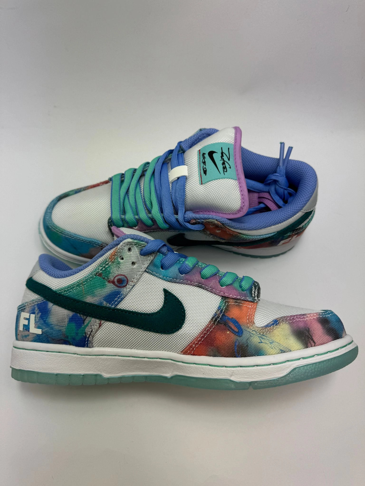 Nike SB Dunk Low "Futura Laboratories Bleached Aqua" Moisture control running on a track oval